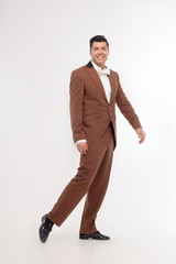 Man in brown suit