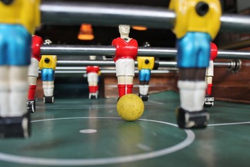 Foosball table football soccar in team colors Soccer Brazil shirts Tabletop table stock photo photograph picture image 