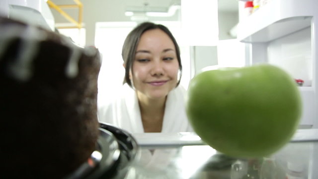 Asian girl in her kitchen