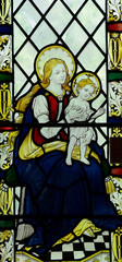 Obraz premium Mary holding Jesus in stained glass