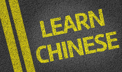 Obraz premium Learn Chinese written on the road