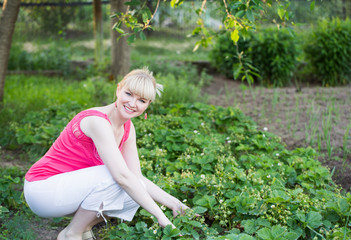 beautiful woman working in the garden