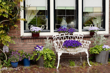 Flower decoration in front of a small house