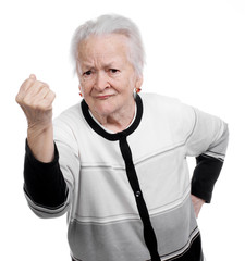 Old woman in angry gesture