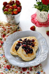 Pancakes with berry topping with fresh berries