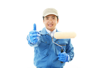 ガッツポーズの作業員