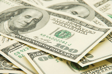 One hundred dollars pile.