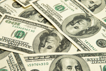 One hundred dollars pile.