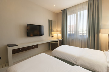 Fototapeta na wymiar Interior of a hotel bedroom 