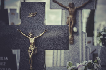 Jesus Christ on the cross in a cemetery