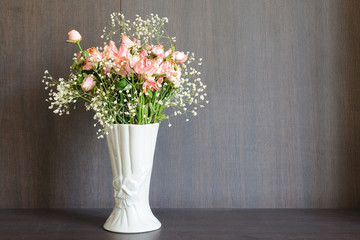 Dried roses in a vase