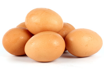 Six brown eggs