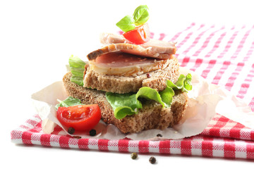 Delicious sandwiches with meet on table close-up
