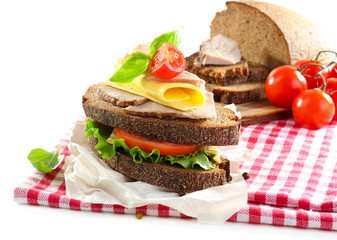 Delicious sandwiches with meet on table close-up