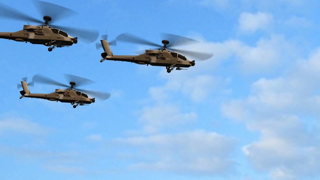 Military Helicopter Boeing AH-64 Apache the overflight