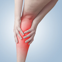 Acute pain in a woman knee.