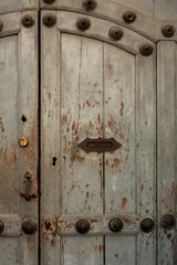 Vintage door with handle and letterbox slot in the house Antigua