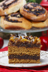 Layer cake decorated with dried fruits and honey