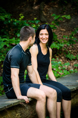 Couple relaxing after jogging