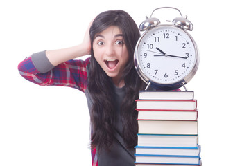 Young female student missing her deadlines on white