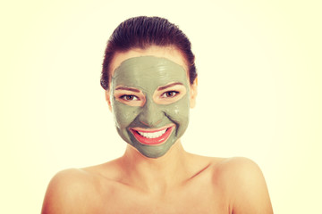 Beautifu toplessl woman with facial mask.