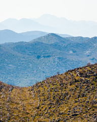 View of the hills behind many other hills
