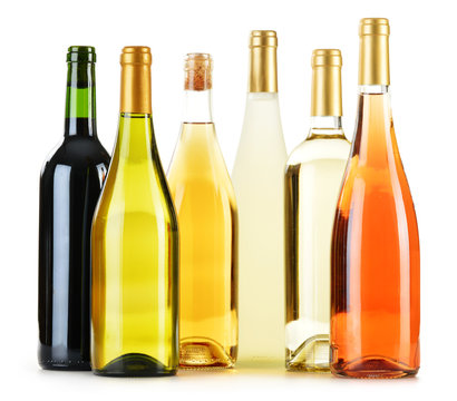 Composition With Variety Of Wine Bottles Isolated On White