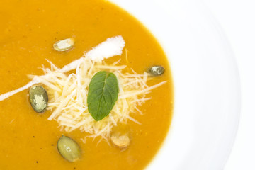 pumpkin soup on a white background in the restaurant