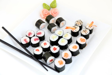 sushi set on white plate. Traditional japanese sushi rolls