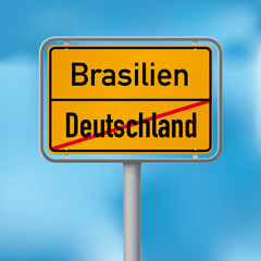 Obraz premium Ortsschild von Deutschland nach Brasilien