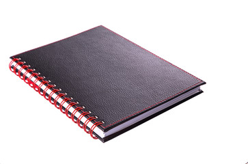 A black notebook with a red ring binder over white background