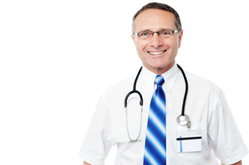 Fototapeta premium smiling middle aged doctor in lab coat