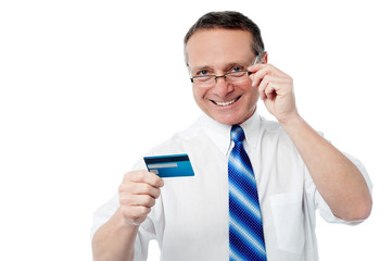Businessman holding credit card
