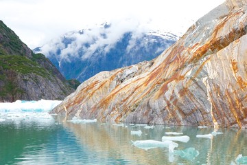 Rock with Rust Streaks in Icy Alaska Bay