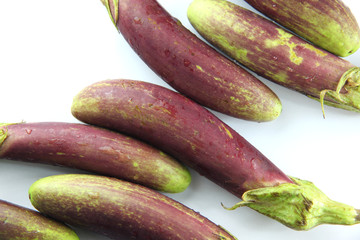 Pile of purple eggplant.