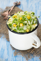 Cabbage salad with corn in vintage cup