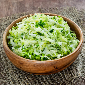 Cabbage salad in wooden bowl