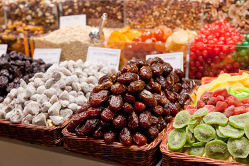 counter with a variety of nuts and dried fruit