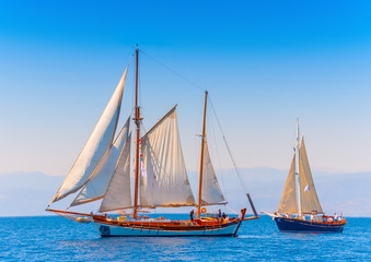 2 Old classic wooden sailing boats in Spetses island in Greece