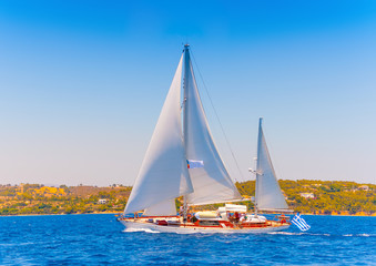 Fototapeta premium Classic wooden racing sailing boat in Spetses island in Greece