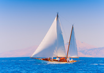 Fototapeta na wymiar Classic wooden racing sailing boat in Spetses island in Greece