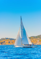 Fototapeta na wymiar Classic wooden racing sailing boat in Spetses island in Greece