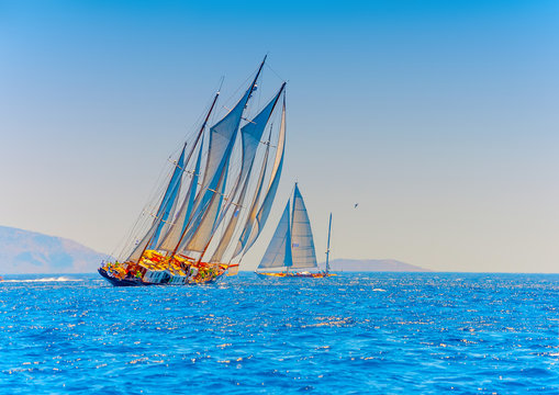 several classic wooden sailing boats in Spetses island in Greece