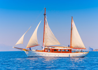 Naklejka premium Old classic wooden sailing boat, in Spetses island in Greece