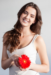 beautiful girl with red flower