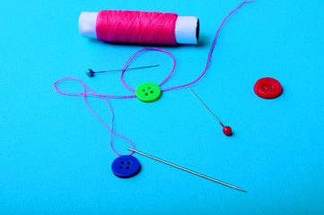 Needle thread and buttons