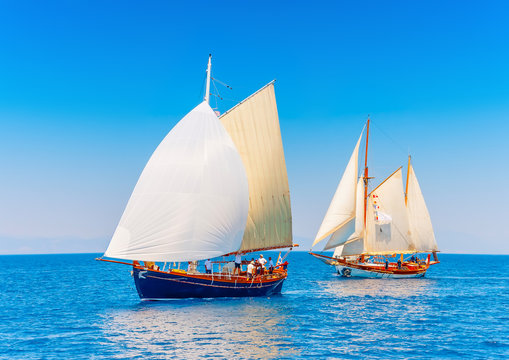 2 classic wooden sailing boats in Spetses island in Greece