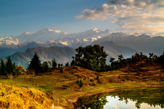 Deoria Tal Lake and Himalayas at sunrise
