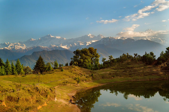 Deoria Tal Lake and Himalayas at sunrise