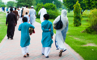 Muslim family going for Eid prayers